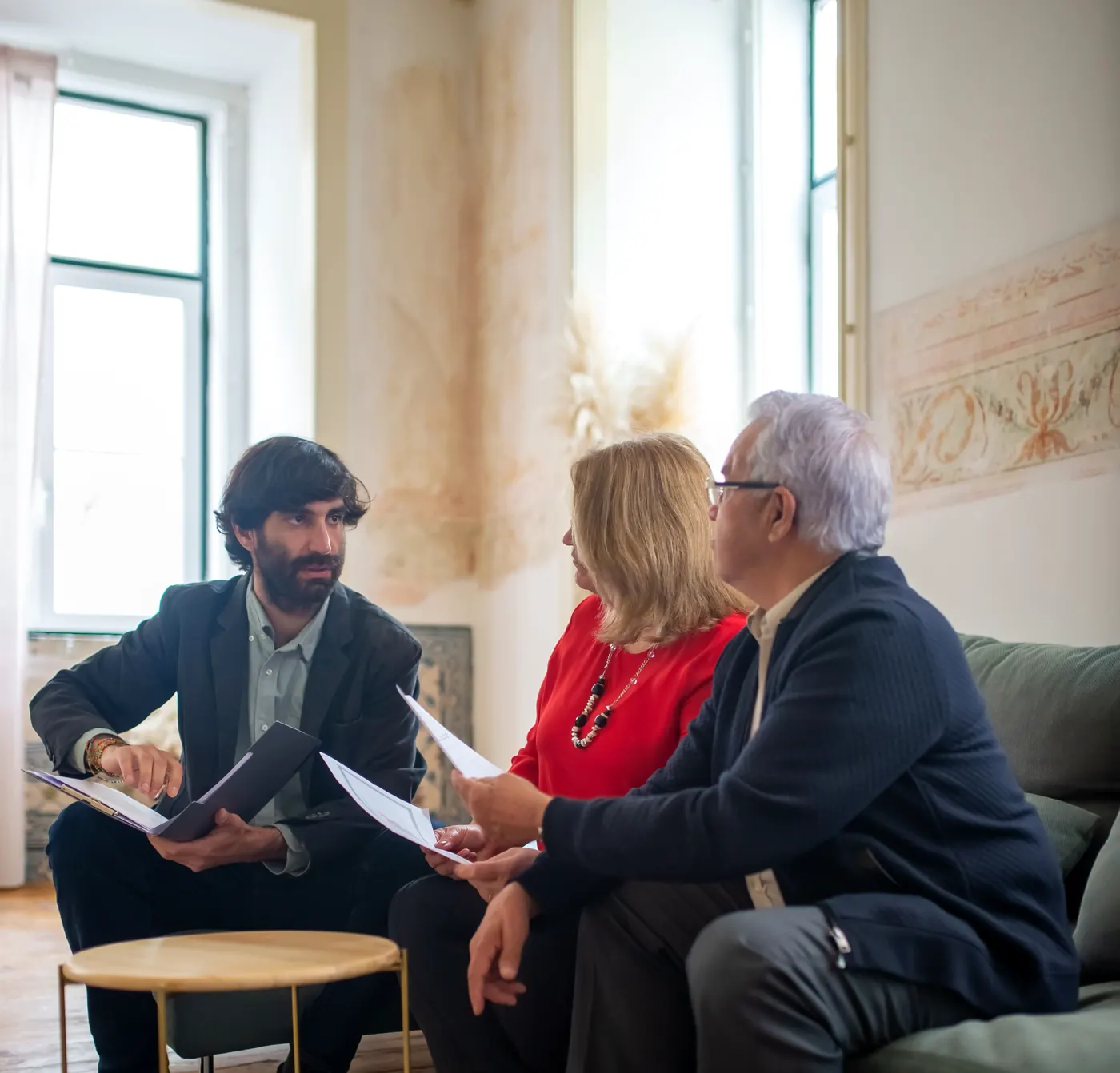Board members reviewing a plan with an advisor