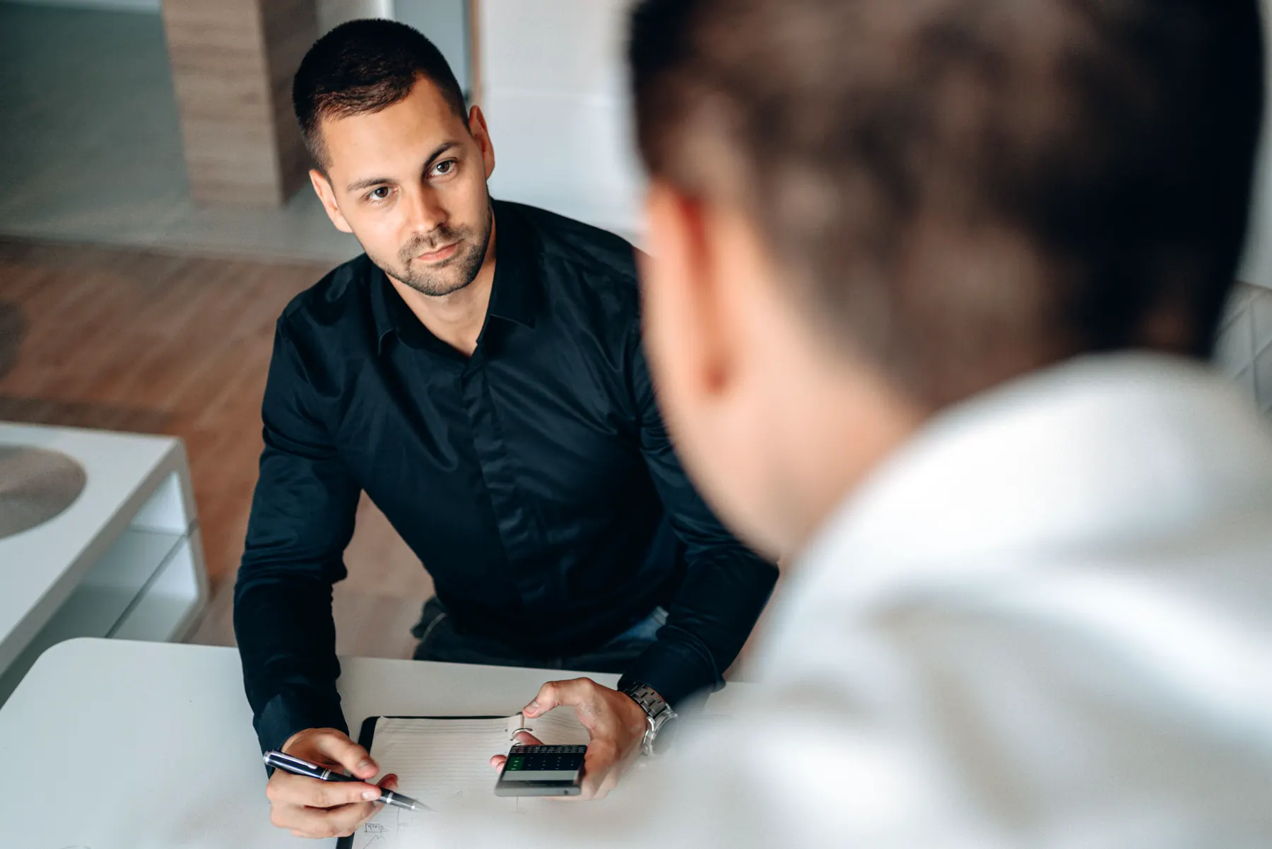 A business owner meeting with an advisor